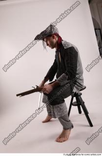 19 2019 01 JACK PIRATE SITTING POSE WITH GUN